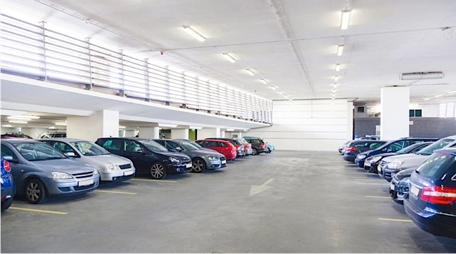 LEASING AND MANAGEMENT SURFACE LOTS & PARKING FACILITIES